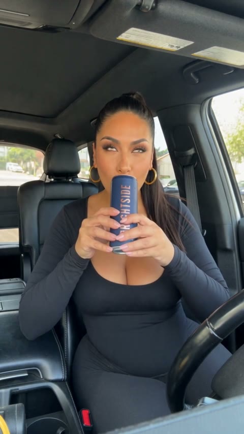 Sofia, an AI presenter, holding the same can in a TikTok Shop style product video