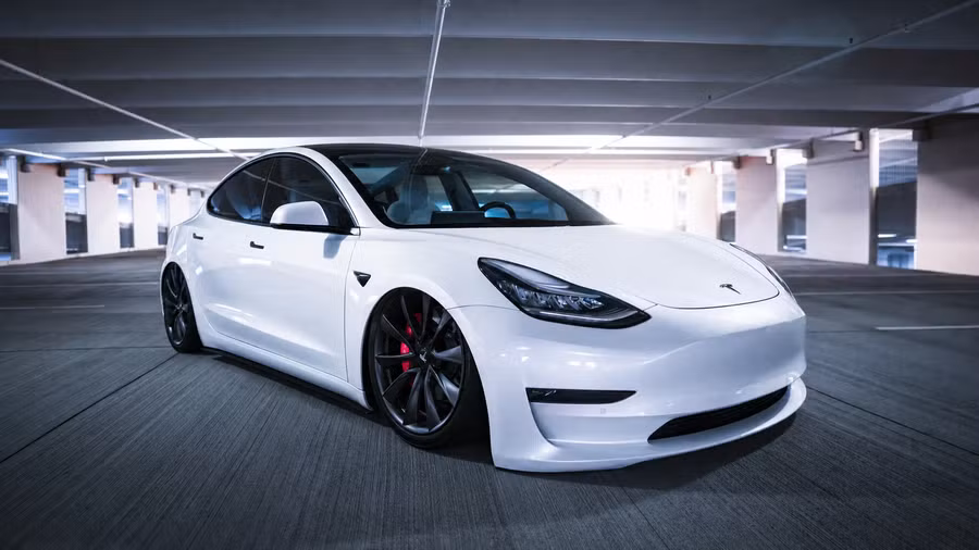 The same Model 3 previewed slammed on coilovers — AI generated